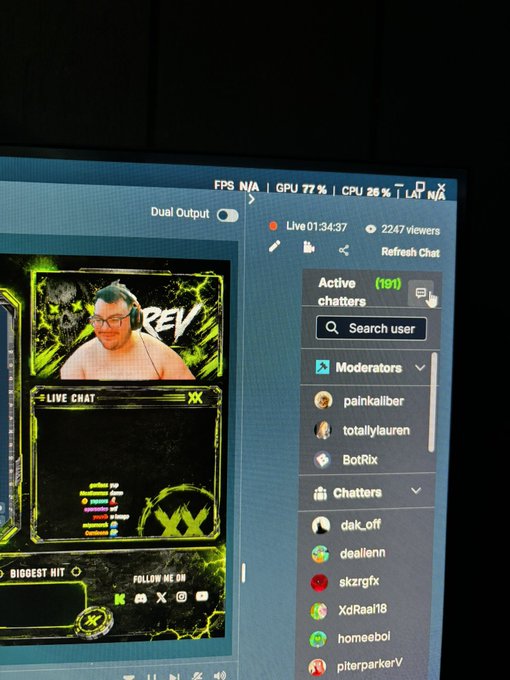 A streaming interface shows a live broadcast with 2247 viewers, displaying the streamer's webcam feed, live chat, and a list of moderators and chatters including 'painkaliber' and 'totallylauren'.