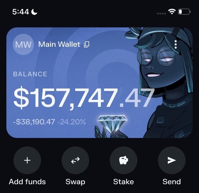 A screenshot of a crypto wallet interface showing a 'Main Wallet' with a balance of '$157,747.47' and a loss of '-$38,190.47 -24.20%', featuring a stylized anime-like character holding a diamond and buttons for 'Add funds', 'Swap', 'Stake', and 'Send'.
