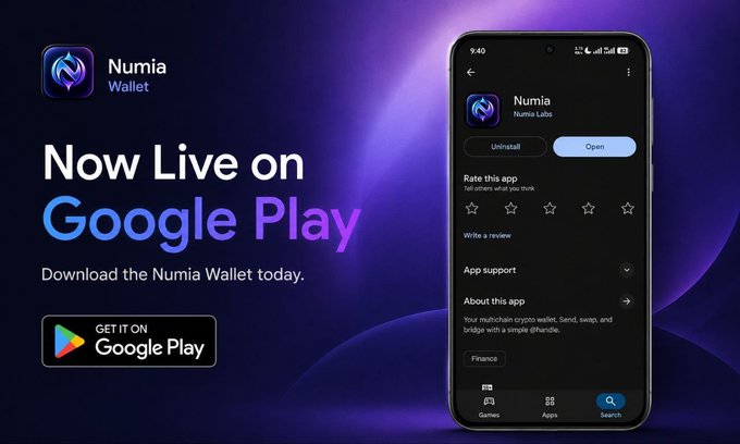 A promotional graphic announcing 'Numia Wallet Now Live on Google Play' with a 'GET IT ON Google Play' button, accompanied by a mockup of a smartphone displaying the Numia app page with 'Numia Labs' and an 'Open' button.