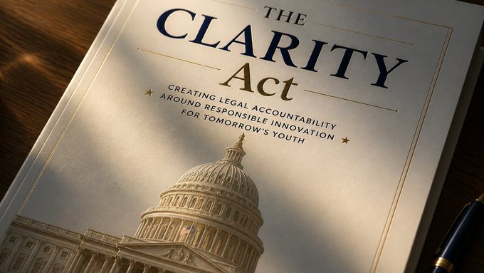 A document titled "THE CLARITY Act – Creating Legal Accountability Around Responsible Innovation for Tomorrow's Youth" rests on a wooden surface, with the U.S. Capitol dome prominently displayed on its cover. The image visually represents the crypto market structure bill currently being negotiated in the Senate, where Democrats are pushing for stronger ethics provisions before lending their support.