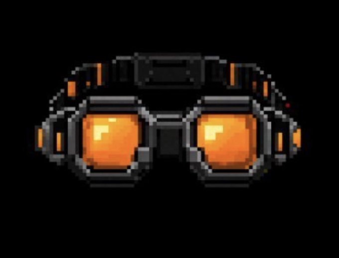 A pixel art illustration of a pair of goggles with glowing orange lenses on a black background.