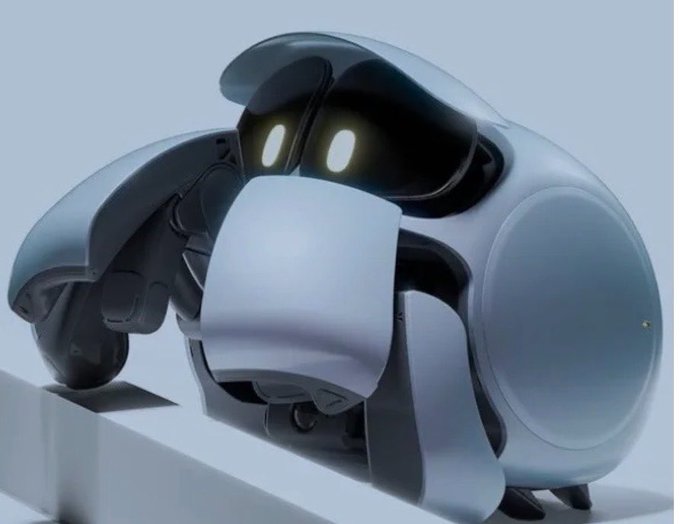 A close-up render of a futuristic robot with a rounded blue and gray body and glowing yellow eyes.
