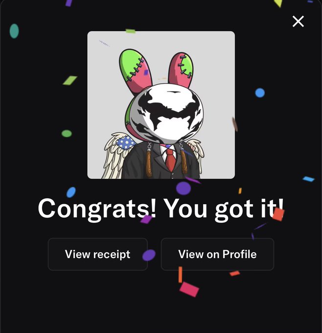 A digital congratulations screen showing "Congrats! You got it!" with a cartoon bunny character wearing a suit and angel wings against a black background with confetti, featuring "View receipt" and "View on Profile" buttons.