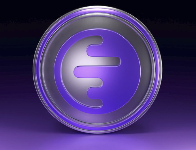 A 3D-rendered purple and silver cryptocurrency-style coin with a stylized 'E' or 'C' logo in the center, displayed against a dark purple background.
