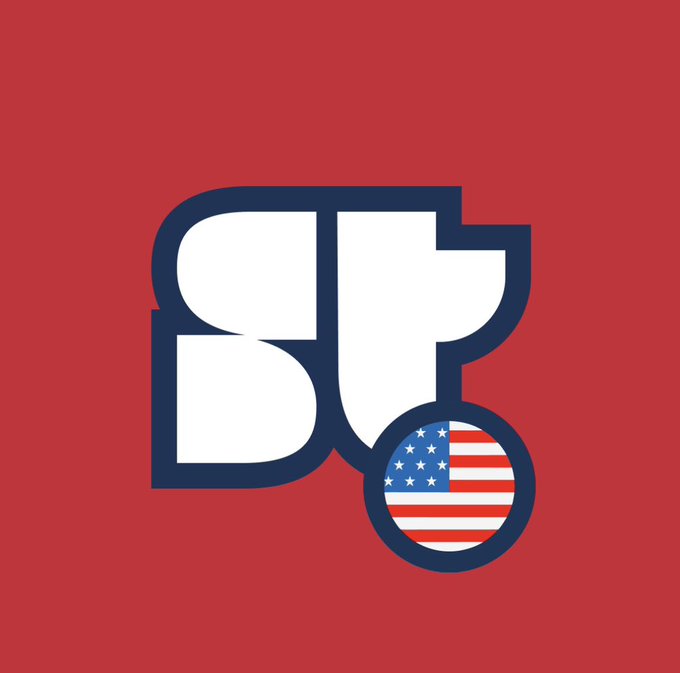 A bold red graphic featuring stylized white "ST" initials with dark blue outlines, paired with a circular American flag emblem positioned in the lower right corner. The design represents Superteam USA, aligning with the post's announcement of joining as an advisor of narrative strategy and founder performance for the Solana-based organization.