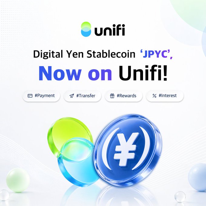 The image features an advertisement for Unifi, a digital yen stablecoin that has been launched into the real world of finance. The main focus of the image is a blue and white digital yen coin with a dollar sign symbol on top. The text in the image reads "Unifi just made a big move into real-world finance. JPYC is now live on the platform bringing a fully usable digital yen into the ecosystem". This advertisement highlights Unifi's innovative approach to creating a stable and secure currency that can be used for online transactions, payments, and other financial activities.