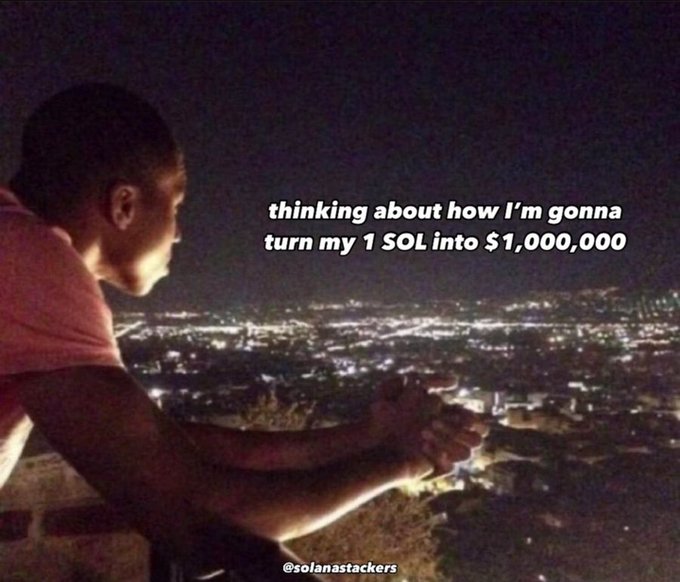 A man looks out over a city skyline at night with text overlay reading 'thinking about how I'm gonna turn my 1 SOL into $1,000,000' credited to @solanastackers.