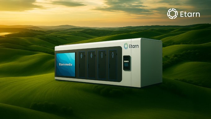 A promotional image for Etarn, showing a white energy storage or industrial unit branded 'Etarn media' set against rolling green hills under a sunset sky, with the Etarn logo in the top right.