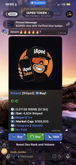 A Telegram chat screenshot of the 'IAPED TOKEN' group (39,261 members) showing a pinned message promoting '$IAped' token on Dex Paid, priced at 0.01136 WBNB ($7.84) with a market cap of $169,505.