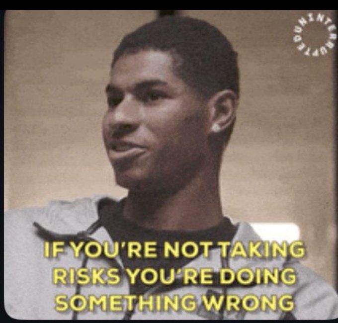 A motivational meme image from The Internet Goat showing a young man with the caption 'IF YOU'RE NOT TAKING RISKS YOU'RE DOING SOMETHING WRONG.'