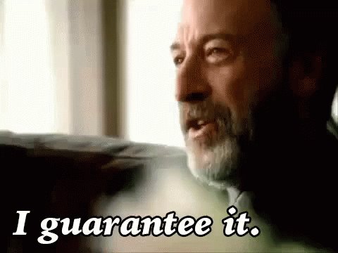 The image features a man with a beard, wearing a green shirt, who appears to be talking or making a statement. The text "guarantee it." is written above him, which could be interpreted as an advertisement or promotional message related to a product or service.