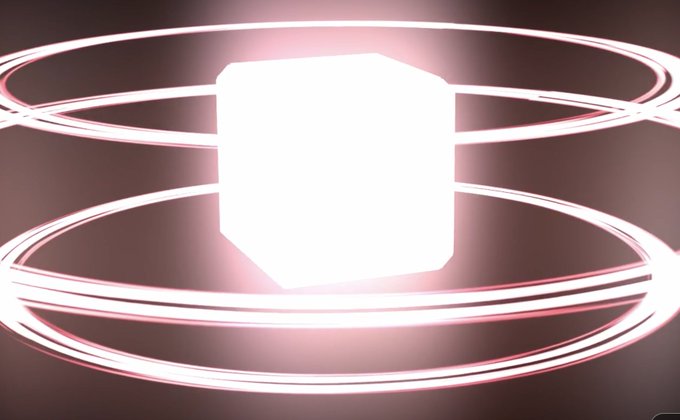 A bright, glowing white cube or hexagonal shape surrounded by intersecting pink and white light rings against a dark background.