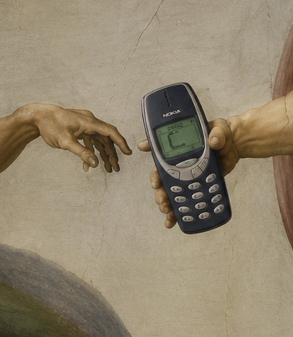 The image features a person holding an old Nokia cell phone, which has a green screen displaying "C". This scene is set against a white background with a painting of a man's hand reaching out towards the phone. The text at the bottom of the image reads "GM i giveth thee power".
