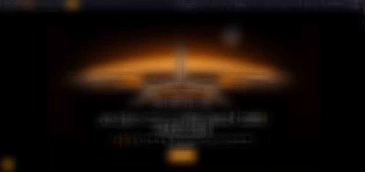 The image shows a website called "BybitArabic" with a large orange logo at the top of the page, which appears blurry due to the low-quality camera or lighting conditions. The website's title reads "ادعُ أصدقاء الفكرة بسيطة: كلما دعوت أصدقاء أكثر، زادت فرصك في الفيديو المرفق.". The website is located in the top left corner of the image, and it appears to be a promotional or informational site for Arabic-speaking countries.
