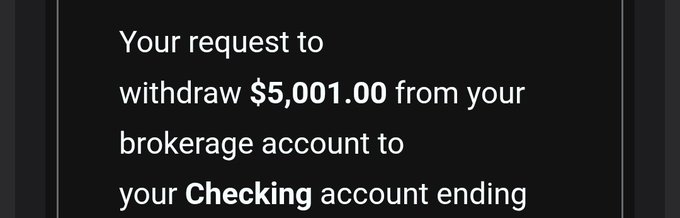 A dark-themed notification or text snippet stating 'Your request to withdraw $5,001.00 from your brokerage account to your Checking account ending' with the amount in bold.