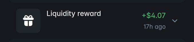 The image shows a post about Liquidity reward, which is displayed on a computer screen or phone screen with the text and visuals providing information regarding an investment opportunity in the marketplace. The post features a gift icon, indicating that this could be related to a special offer or event. While it's not clear what the content of the post says specifically, it seems to discuss financial matters such as an investment or reward system.
