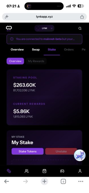 A mobile screenshot of the lynkapp.xyz website showing a 'Stake' overview with a staking pool of $263.60K, current rewards of $5.86K, and options to 'Stake Tokens' or 'Unstake'.