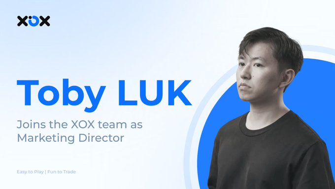 An announcement graphic featuring a black-and-white portrait of a man alongside text reading "Toby LUK — Joins the XOX team as Marketing Director," with the XOX DEX logo and tagline "Easy to Play | Fun to Trade." The image visually celebrates Toby Luk's new role as Marketing Director at XOX DEX, aligning with his post about leading global marketing strategy and community growth.