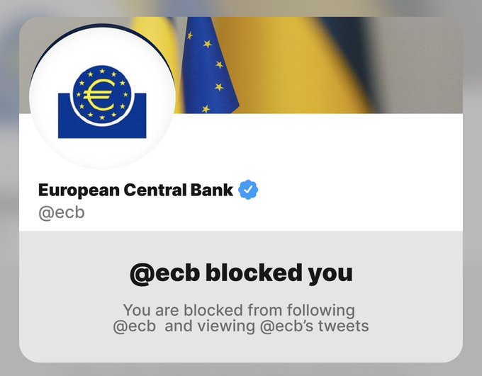A Twitter screenshot shows the official "European Central Bank" account (@ecb) has blocked the user, displayed with the message "@ecb blocked you — You are blocked from following @ecb and viewing @ecb's tweets," likely being shared as a tongue-in-cheek badge of honor or source of pride, fitting the caption "Proud of this achievement."