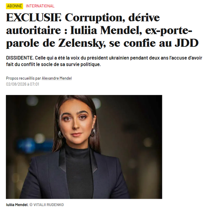 The image is a French newspaper headline from Le Journal du Dimanche (JDD) dated 02/08/2026, featuring an exclusive interview with Iuliia Mendel, former press secretary to Ukrainian President Zelensky, accusing him of corruption and authoritarian drift while using the conflict for political survival, accompanied by a portrait photo of her credited to Vitalii Rudenko.

The post's suggestion of a lawsuit reflects commentary on Mendel's public accusations against Zelensky, with her leaked interview making her potentially vulnerable to legal action over her claims.