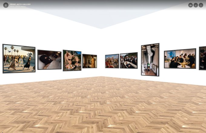 Screenshot of a virtual 3D art gallery titled 'PRINT AUTO GALLERY' displaying framed artworks on white walls with wooden parquet flooring.