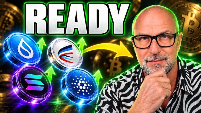 Crypto-themed YouTube thumbnail showing a bald man with glasses in a zebra-stripe shirt with the word 'READY' above him, surrounded by logos for Sui, an unspecified coin, Solana, and Cardano with green upward arrows indicating price increases.