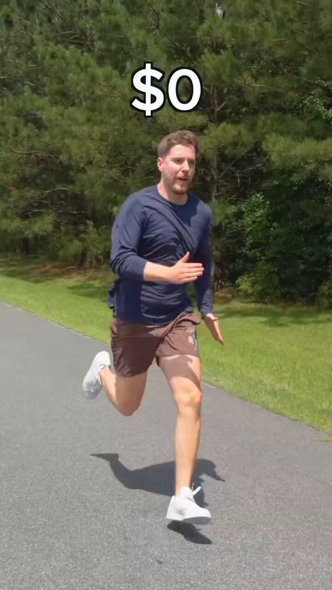 The image shows a man running down a street, wearing shorts and white shoes while holding his arms out for balance as he runs. There are also trees visible in the background of the photo. The caption of the image reads "Actually a based tweet $SOL bags pumping".