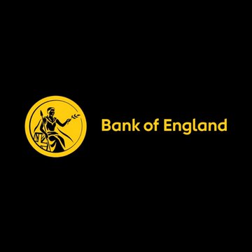 The image displays the official logo of the Bank of England, featuring a gold circular emblem with a seated figure alongside the text "Bank of England" on a black background. This logo corresponds to the central bank mentioned in the post about advancing its Digital Pound Lab to Phase 2 for testing CBDC and stablecoin interoperability in trade finance.