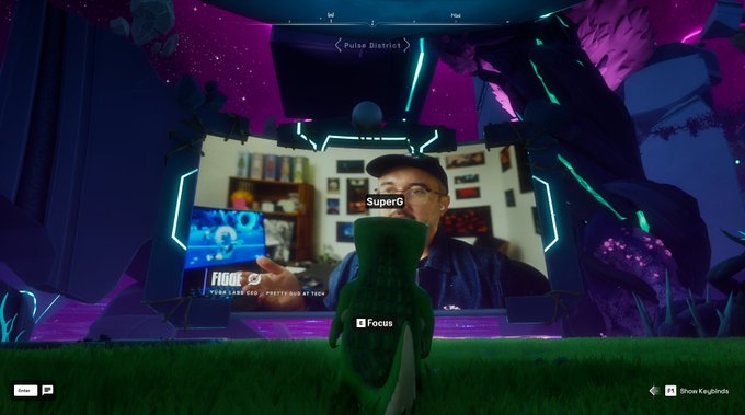 A video game screenshot showing a character labeled 'SuperG' in front of a portal marked 'Pulse District' with prompts to 'Focus' and 'Show Keybinds'.