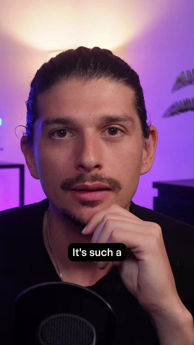 The image features a man with a mustache wearing a black shirt who appears to be posing for a photo or video. The caption of the image reads "It's such a @solanamobile dApp store reaches 1,000 apps!". This statement is likely referring to the number of apps available on the app store and emphasizes the popularity of the app in question.
