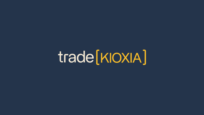 The image features a graphic design of the trade (kioxia) logo. The logo consists of yellow text, written in all capital letters that reads "trade" and "kioxia". This design serves as an advertisement forHYPE's trading platform. The background color of the logo is a dark blue. In this image, there are no specific details about the content or context of the post where the logo appears, but it does indicate that the logo itself will greatly increase the volume and revenue of HYPE's followers.