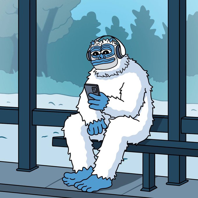 A cartoon illustration of a blue-faced, white-furred furry yeti-like character wearing headphones and looking at a smartphone while sitting on a bench at a bus stop.