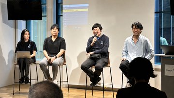 The image shows a group of people sitting around a table with laptops open, engaged in a discussion or presentation. There are four individuals visible in the scene, each seated on chairs placed around the table. The room has white walls that provide a neutral backdrop for the gathering. A TV is mounted on one wall, and there's also a laptop present on another surface near the group of people.

The post includes text that reads: "Had a great time in Tokyo last week with @KaiaChain and @jpyc_official. Lots of thoughtful discussions around JPYC, stablecoin adoption, cross-border payments, and the future of Asia's digital financial network". The image seems to be related to this post as it features people sitting at a table with laptops open, possibly discussing or presenting on topics such as cryptocurrency, digital finance, and the future of the industry.