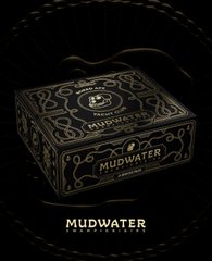 A black decorative box with gold detailing features the text 'MUDWATER ORIGINAL'.