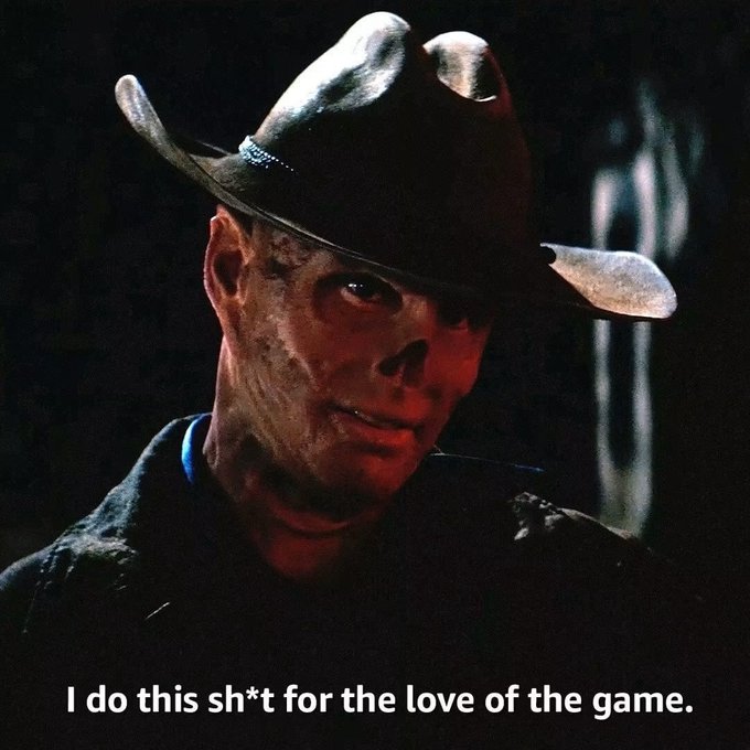 A dark, cinematic image of a man in a cowboy hat with face paint, captioned 'I do this sh*t for the love of the game.'
