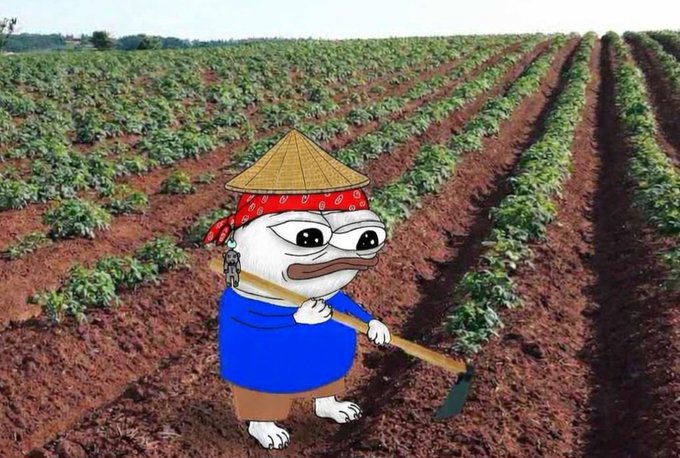 Image of a Pepe-style cartoon frog character dressed as a farmer wearing a bamboo hat, red bandana, and blue shirt holding a hoe, composited over a photo of an agricultural field with rows of crops.