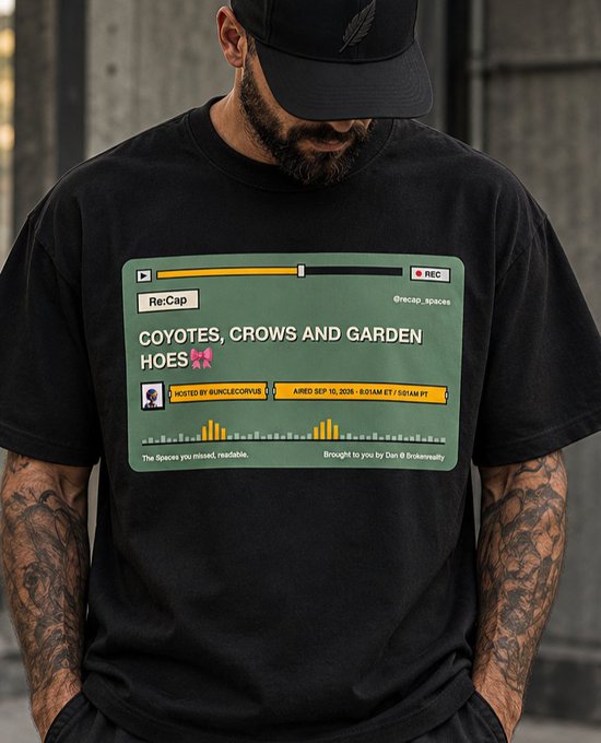 A bearded, tattooed man wearing a black cap and a black t-shirt designed to look like a podcast player interface for the episode "Coyotes, Crows and Garden Hoes."