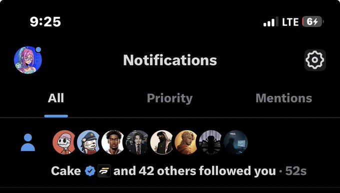 A mobile notifications screen on Twitter/X showing a notification that 'Cake' and 42 others followed you, with several anime-style profile pictures visible.