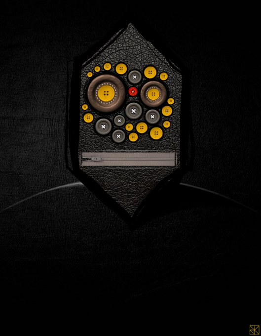 A diamond-shaped patch on black leather, decorated with an arrangement of various sized buttons including yellow, brown, and gray, with a small zipper detail.