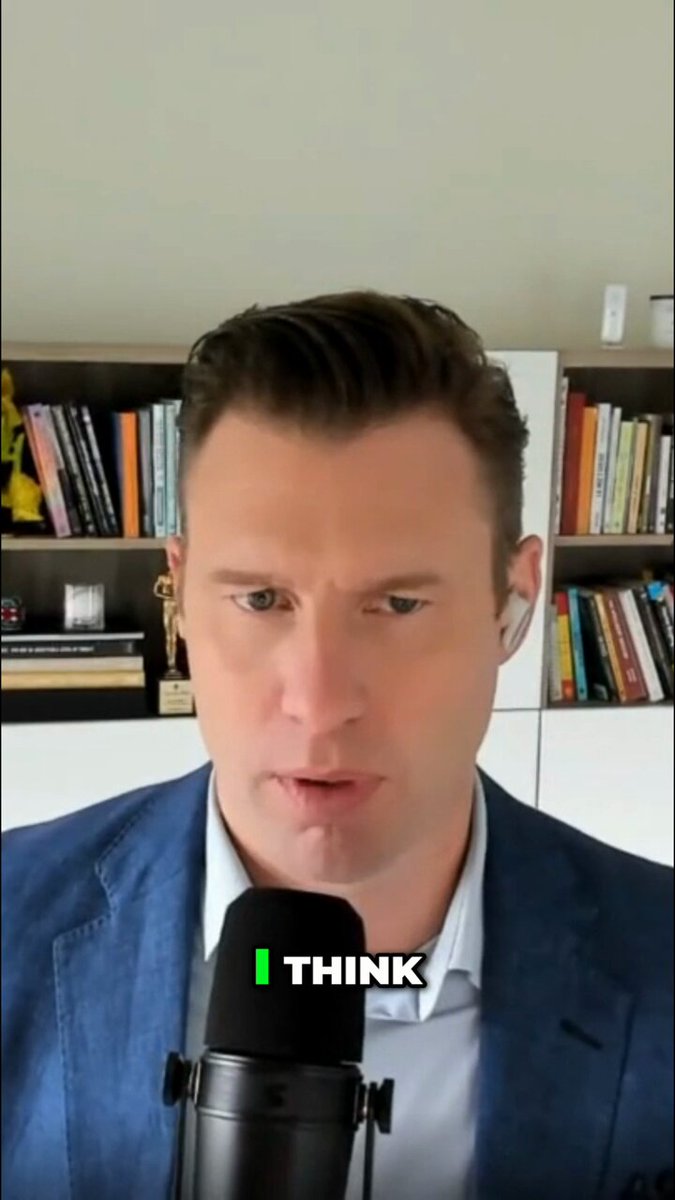 The image features a man wearing a blue suit jacket, speaking into a microphone while standing behind a bookshelf filled with various books. The caption of the image reads "I Think Tether", which suggests that the man might be discussing or promoting the use of digital currency like Tether on the Tron network.