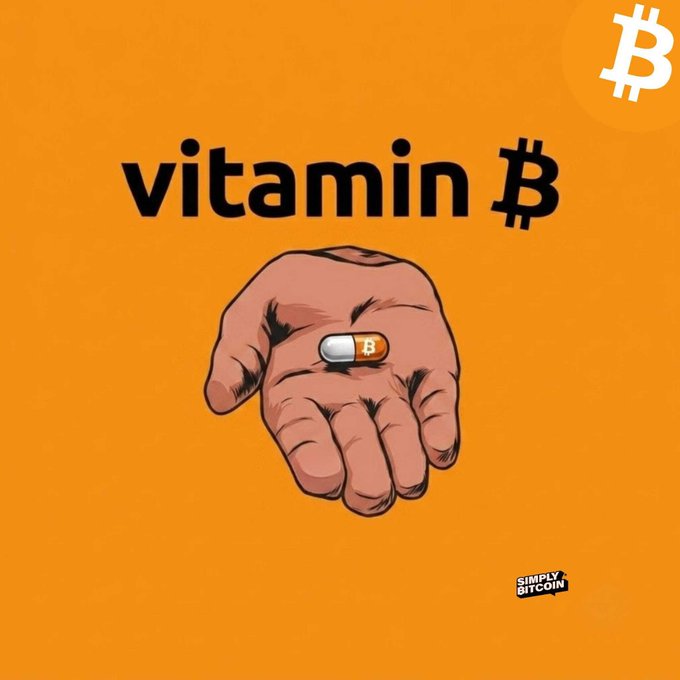 The image features a hand holding an orange pill, which appears to be a vitamin B pill. The caption below the image reads "You need Vitamin B", indicating that the vitamin is essential for maintaining good health. The background of the image is yellow, with the word "Bitcoin" written in black text above it. This suggests that there might be some connection between the vitamin and Bitcoin, possibly related to a digital currency or cryptocurrency project.