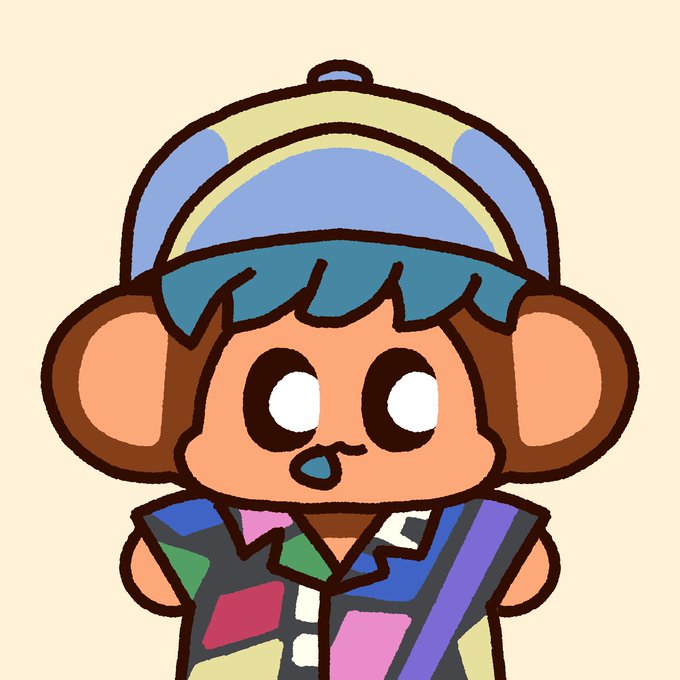 A cartoon character resembling a monkey wearing a backwards yellow and blue cap and a colorful patchwork shirt.