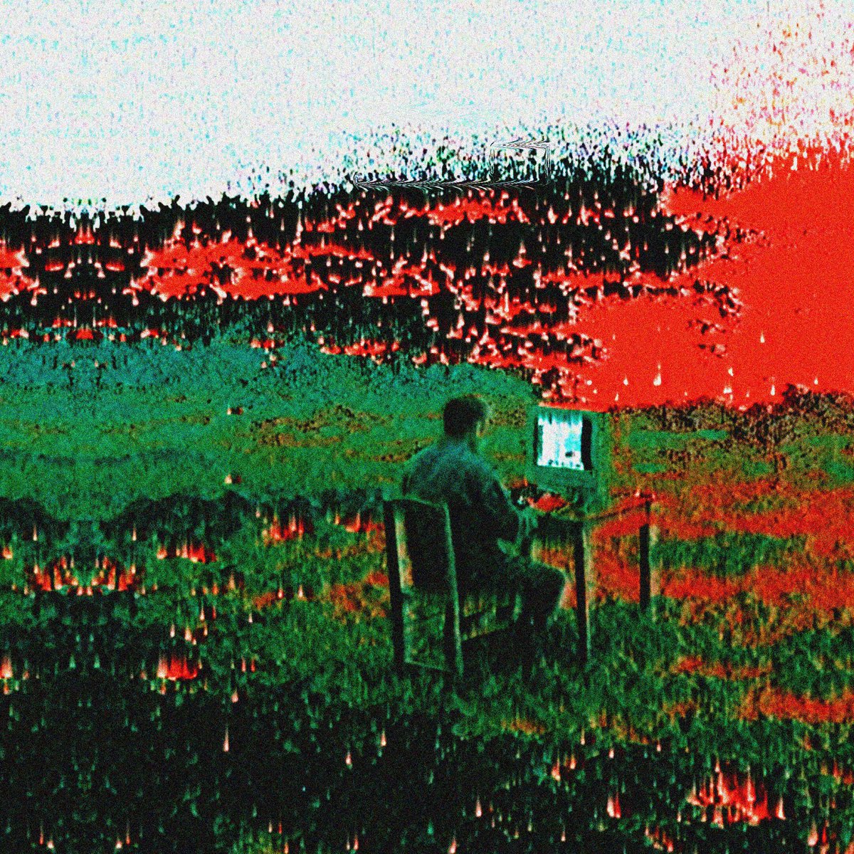 The image features a man sitting at a desk, using his computer while wearing a hat. The background of the photo shows a field with red flowers, creating an interesting contrast between the man's activity indoors and the natural outdoor setting. The caption for this image reads "Holding @spellamin The HODL Master token gets you absolute masterpieces like the ones below. It’s one of the (still) affordable ways to build a full body of work of Spell with new legendary airdrops hitting your wallet just for owning the HODL master".