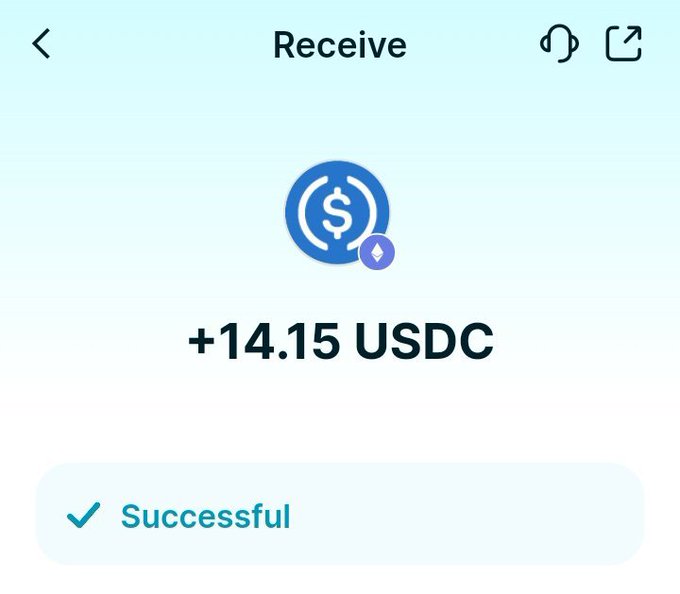 A cryptocurrency wallet confirmation screen showing a successful receipt of +14.15 USDC, marked with a blue dollar sign icon and green checkmark.