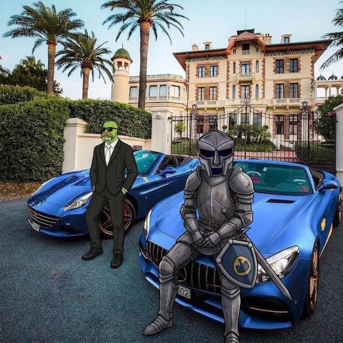 A digital artwork/composite image featuring an illustration of a green-faced character in a suit and a medieval knight in armor positioned in front of two blue Ferrari cars, with a large mansion and palm trees in the background.