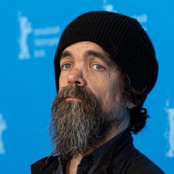 The image shows a bearded man wearing a black beanie, standing in front of a blue backdrop that appears to feature the Berlinale film festival logo. The accompanying post suggests this may be Jack Dorsey, though he is not explicitly named or identified in the image itself.