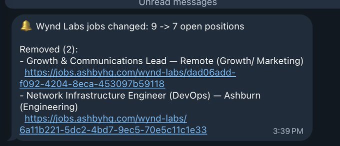 A notification from Ashby HQ shows Wynd Labs jobs changed from 9 to 7 open positions, with two roles removed: Growth & Communications Lead (Remote, Growth/Marketing) and Network Infrastructure Engineer (DevOps, Ashburn, Engineering). The post suggests improved communications for $GRASS are on the way, likely alluding to the removal of the Growth & Communications Lead role at Wynd Labs.