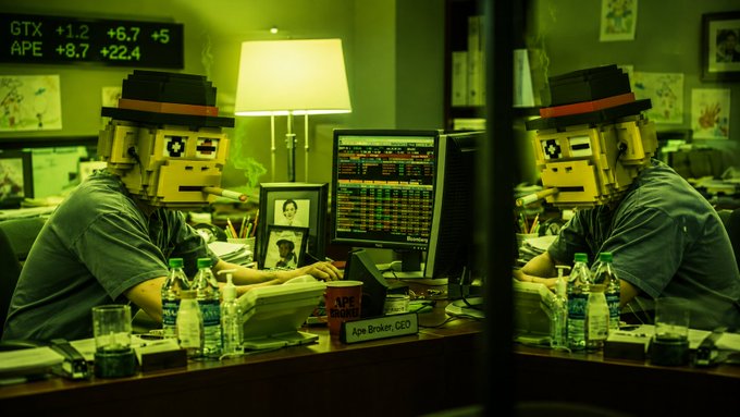 A pixel-art style image of a figure wearing a blocky yellow mask and hat working at a trading desk with multiple monitors, with stock tickers GTX +1.2, APE +8.7, and other numbers visible.