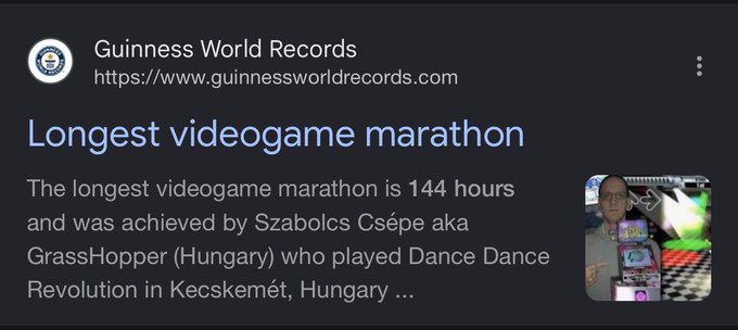 A Google search result snippet from Guinness World Records (guinnessworldrecords.com) stating 'Longest videogame marathon' is 144 hours, achieved by Szabolcs Csépe aka GrassHopper (Hungary) playing Dance Dance Revolution.