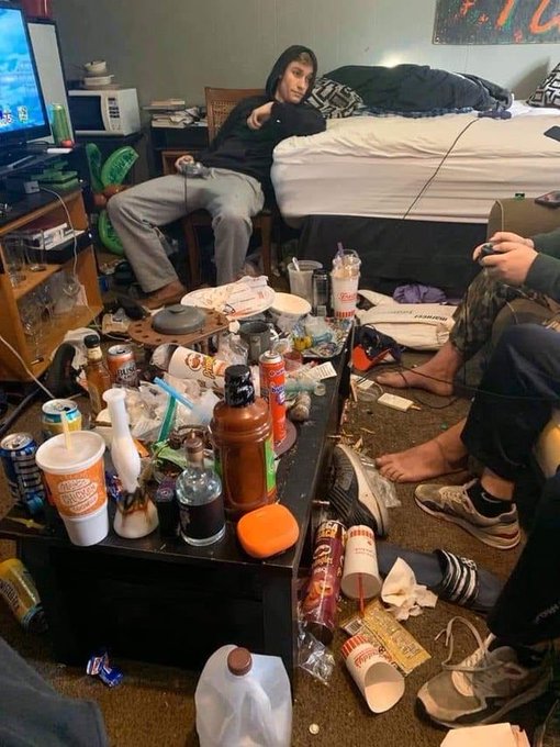 A messy hotel room strewn with fast food cups, Pringles cans, energy drinks, alcohol bottles, and other debris, with several people lounging around. The caption "Onchain is coming back bro" humorously plays on the chaotic, party-like scene, suggesting a celebration of a crypto market revival in the same disheveled style.